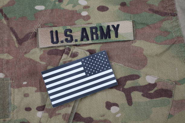 istock US flag patch with dog tag on multicam camouflage uniform 1188004100