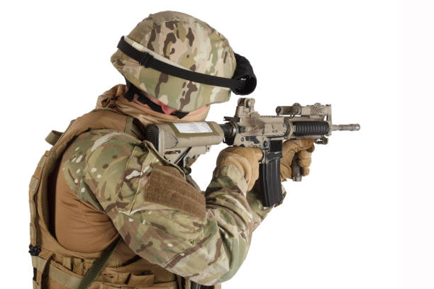 istock soldier with assault rifle on white background 1188004145