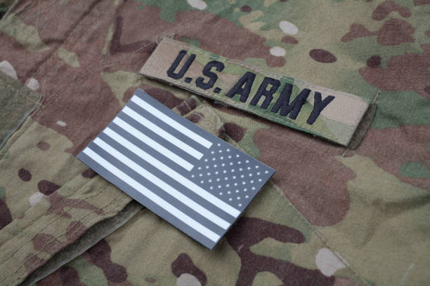 istock US flag patch with dog tag on multicam camouflage uniform 1188004855
