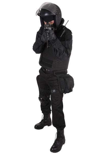 istock police special forces officer with submachine gun in black uniform 1188005056