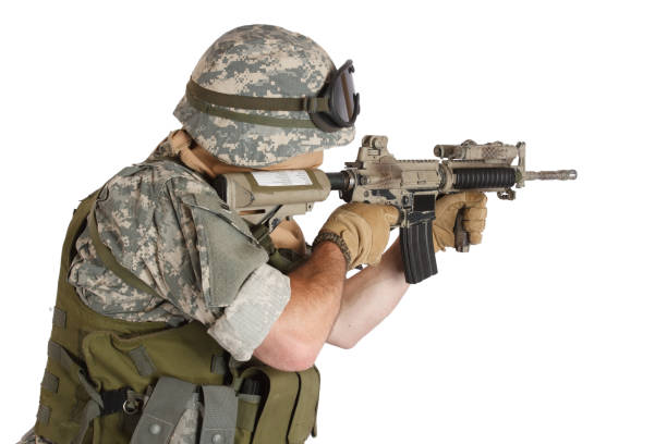 istock US soldier with assault rifle on white background 1188008440