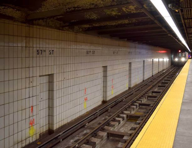 istock Public Mass Transit Subway Car Train on Track Rails Underground Beneath City 1188008611