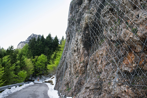 rockfall protection nets, installed to protect an rock wall