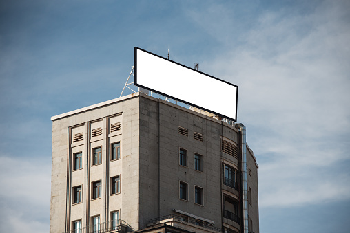 A balnk billboard /advertisement panel on a building