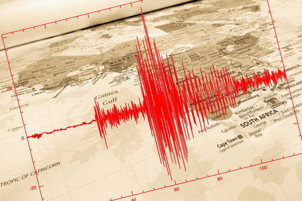 Red seismic wave over Africa map stock photo