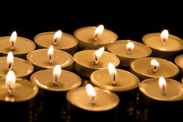istock Close-up of small burning candles 1188015378