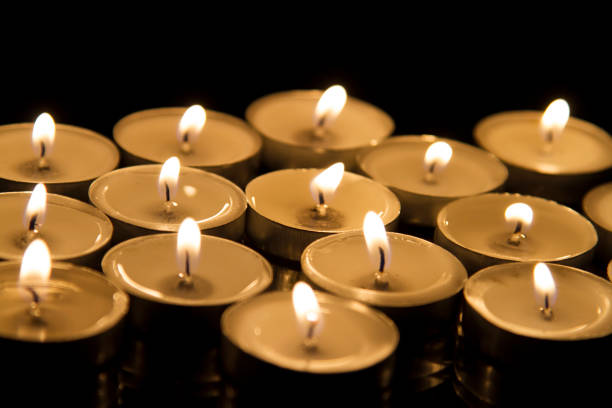 istock Close-up of small burning candles 1188015381
