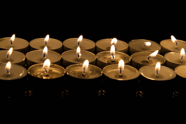 istock Close-up of small burning candles 1188015394