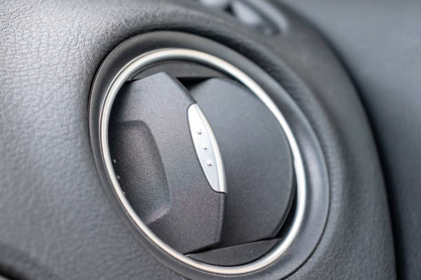 istock Car vent, air conditioner or climate control nozzle close up 1188017656