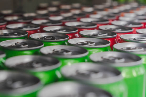 istock Solf soda pop drink cans on shelves at convenience store 1188018354