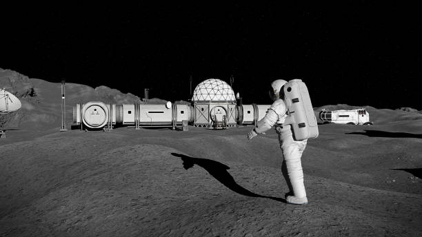 istock astronaut on Moon surface, lunar landscape with space habitat 1188019356