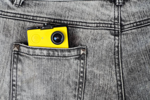 istock Action camera in trouser jean pocket For travel. 1188019627