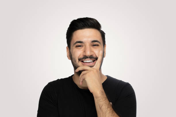 istock Laughing young man over isolated  gray background 1188024855