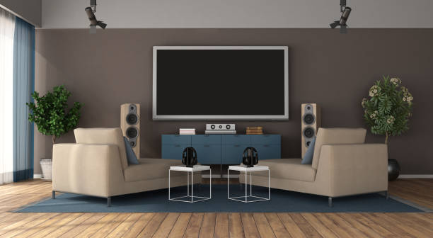 Modern living room with home cinema system Modern living room with two chaise lounge and home cinema system - 3d rendering
room does not exist in reality, Property model is not necessary subwoofer photos stock pictures, royalty-free photos & images