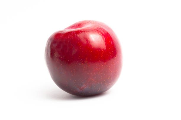 Ripe sweet tasty red plum heap
