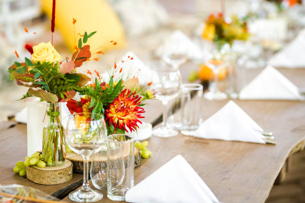 istock Beautiful autumn colored taable decoration for a special event. Fresh flower table decoration. 1188033652