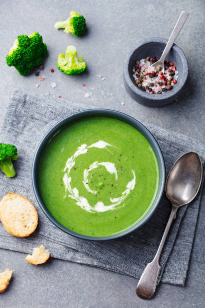 istock Broccoli, spinach cream soup in a bowl. Top view. 1188035880