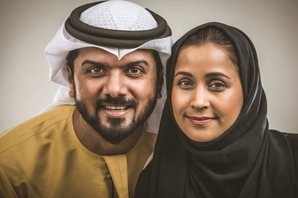 istock ARabian couple isolated on grey background 1188037592