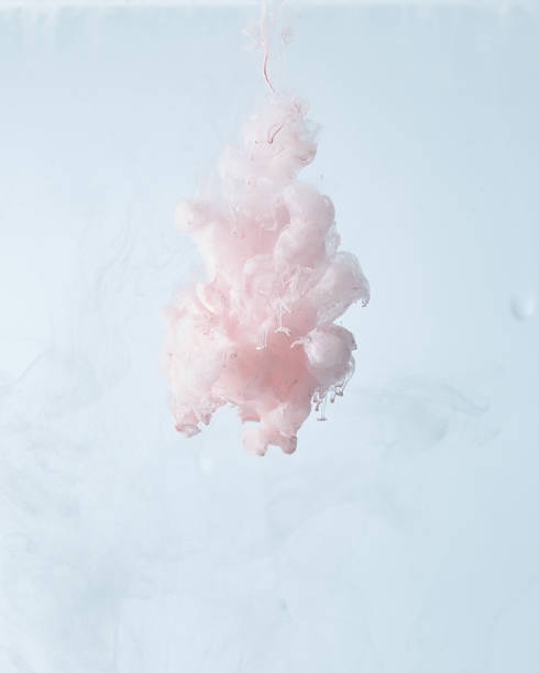 istock Colors dropped into liquid and photographed while in motion. 1188038377