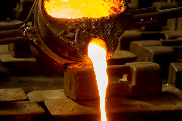 istock metal casting process with red high temperature fire in metal part factory 1188038640