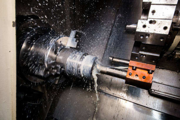 istock Close up of CNC machine at work 1188038650