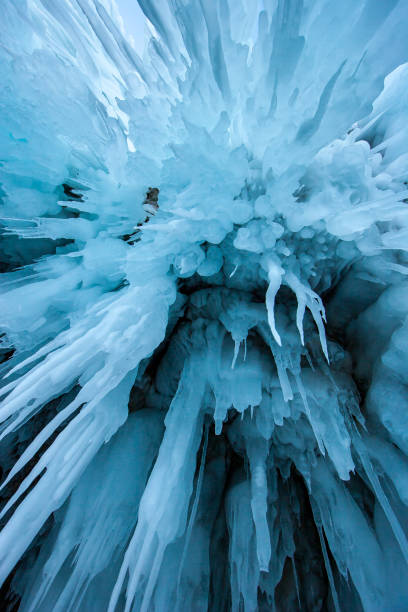 istock Natural texture background, long blue icicles shot from below. 1188039778