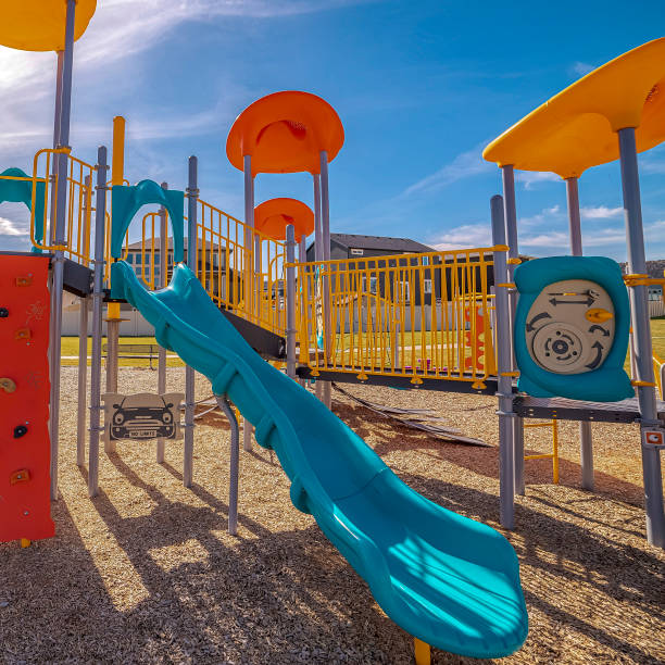istock Square frame Colorful slides and equipment on a playground 1188043863