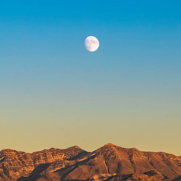 istock Square frame Moonrise over the rugged mountains in Provo Canyon 1188045575