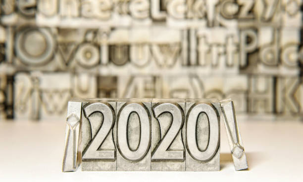 istock Happy new year 2020 between exclamation marks on background with press types 1188045576