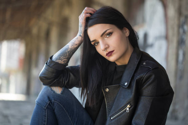istock Young woman with tattoos 1188049109