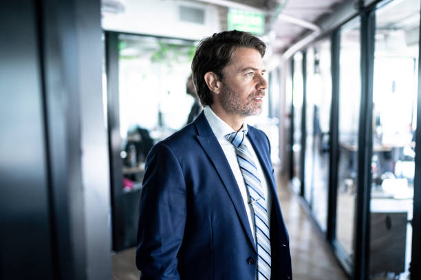istock Businessman looking away in the office 1188051507