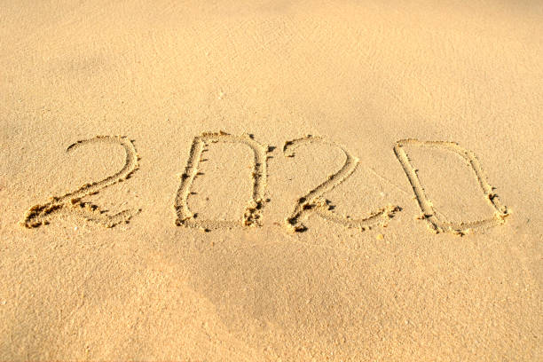 istock 2020 number on beach sand 1188051589