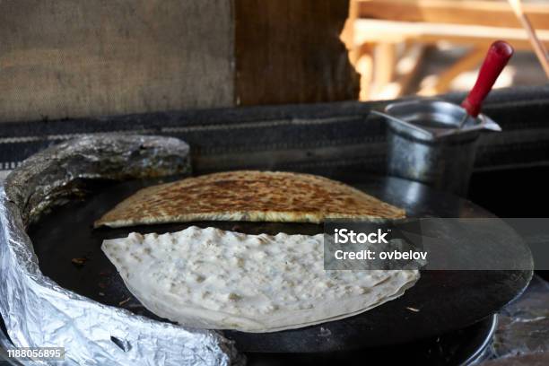 https://media.istockphoto.com/id/1188056895/photo/traditional-turkish-gozleme-stuffed-with-meat-and-cheese-are-fried-on-the-stove.jpg?s=612x612&w=is&k=20&c=5oXpQovWnYwjdAx6TBR4INyFrpn0vyGfXOZ71H9XllY=
