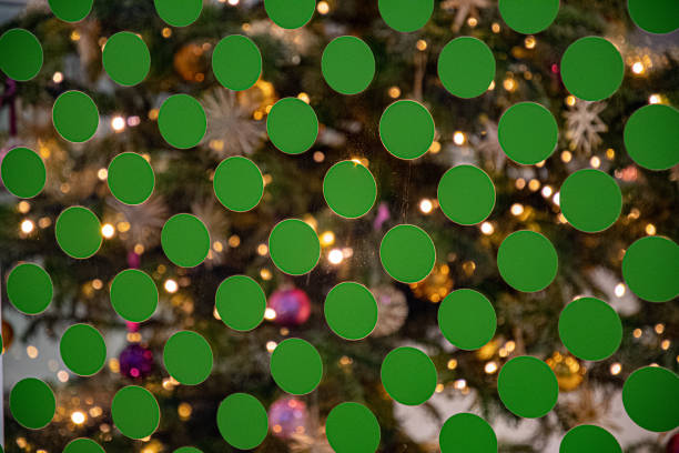 Christmas decorations colorful balls and toys, fir tree branches and cones, lanterns, small angel and Santa figures. Christmas market fair in Europe. Preparation for celebration of xmas and New Year