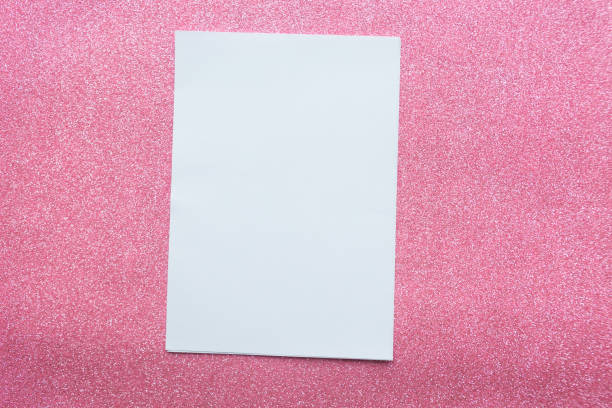 istock White mockup blank on glitter pink background 1188059229