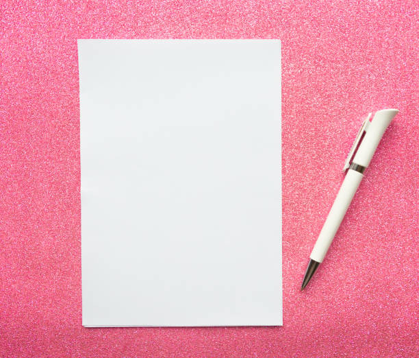 istock White mockup blank and pen on glitter pink background 1188059253