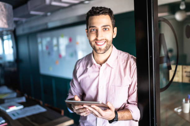istock Portrait of businessman using digital tablet 1188064366