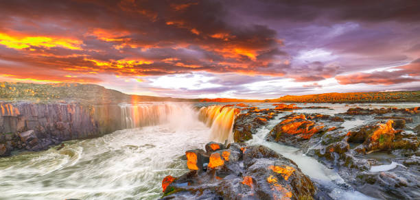 istock Dramatic sunset view  of waterfall in Iceland 1188068508