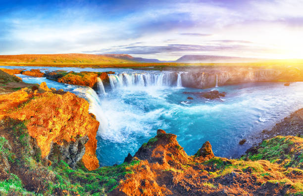 istock Dramatic sunset view  of waterfall in Iceland 1188068945
