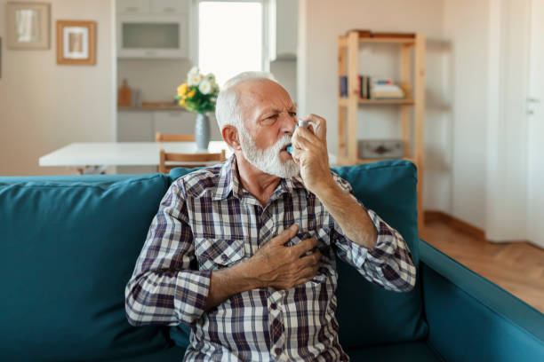 istock Senior Man Inhaling Asthmatic Cure 1188071276