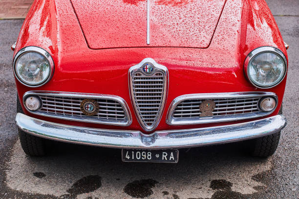 Topacz, Poland - 23 August, 2025: Classic Alfa Romeo cars on a parking during the public meeting of classic car friends. These vehicles were the ones of the most elegance cars in 60. and 70. On the first plan wee see the Alfa Romeo Alfetta GTV.