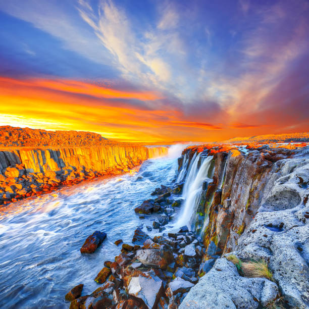 istock Dramatic sunset view of fantastic waterfall in Iceland 1188072171