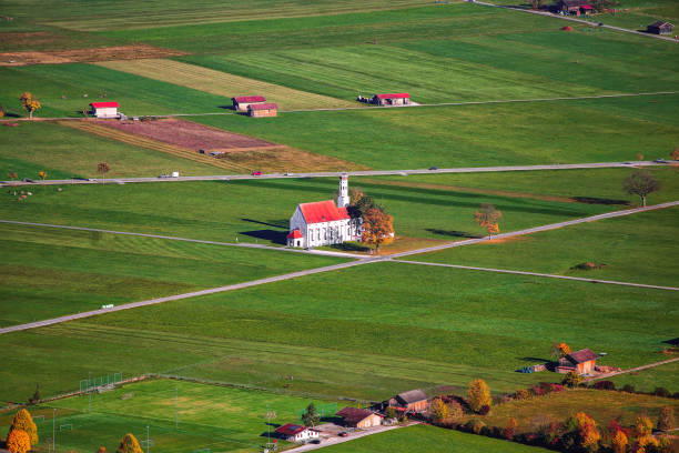 istock St. Coloman pilgrimage church in autumn 1188072271
