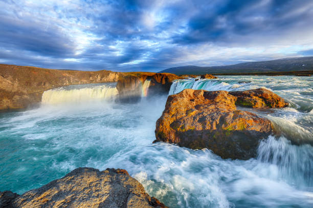istock Dramatic sunset view of fantastic waterfall in Iceland 1188077589