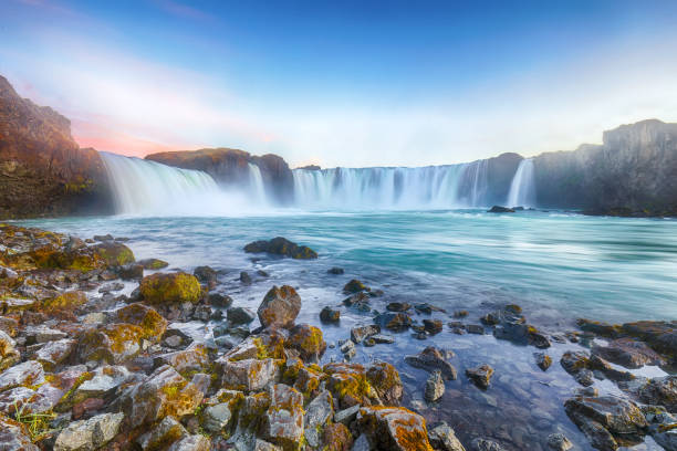 istock Dramatic sunset view of fantastic waterfall in Iceland 1188077591