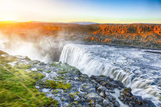istock Dramatic sunset view of fantastic waterfall in Iceland 1188077605