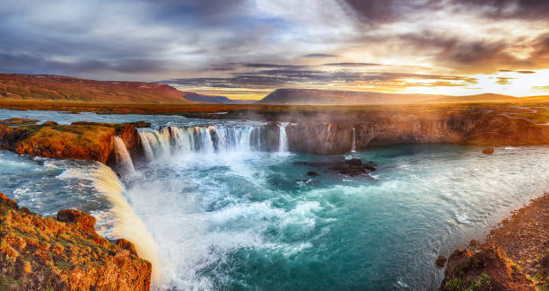 istock Dramatic sunset view  of waterfall in Iceland 1188084307