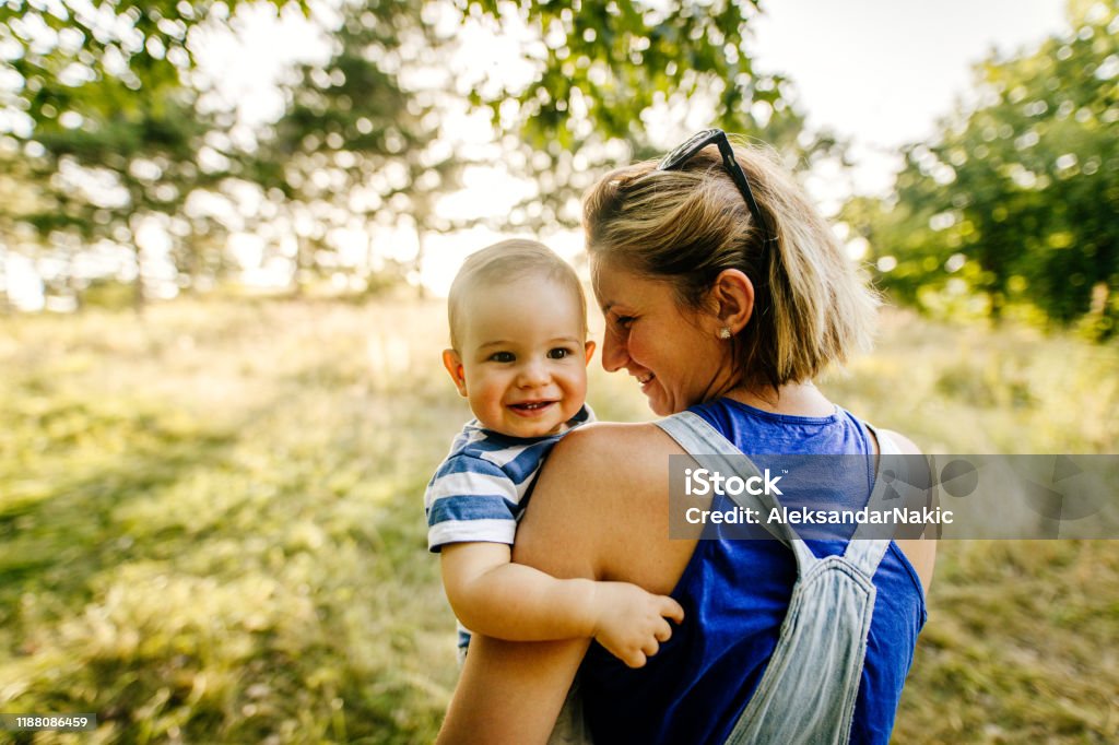 Baby boy with mommy in the nature Photo of baby boy and his mommy in the nature Baby - Human Age Stock Photo