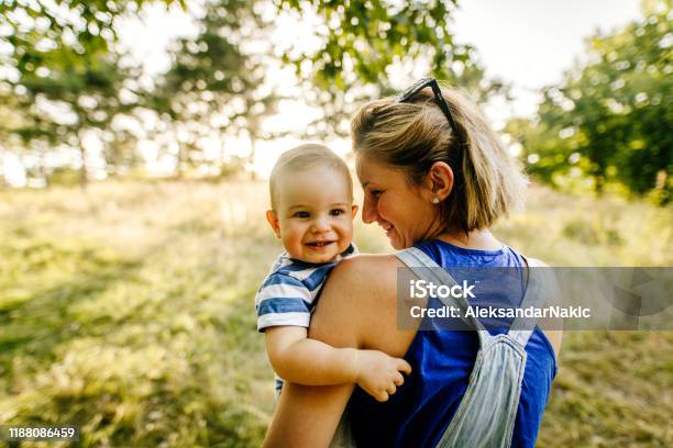 Baby Boy With Mommy In The Nature Stock Photo - Download Image Now - Baby - Human Age, Mother, Family