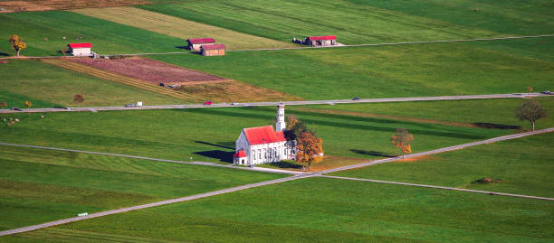 istock St. Coloman pilgrimage church in autumn 1188087139